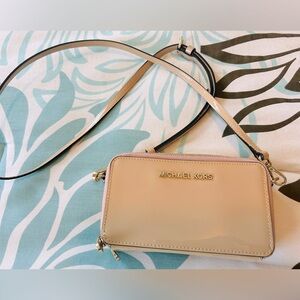 Michael Kors tan/cream small crossbody bag.